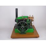 A Beam Engine by Stuart Models in green livery with copper horizontal boiler on wooden plinth, 16