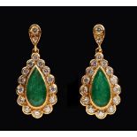 A pair of Emerald and Diamond Cluster Ear Pendants each set pear-cut emerald within frame of