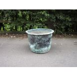 A copper Cauldron with studded detail, 1ft 7in diam