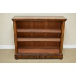 A Regency rosewood Open Bookcase, the rectangular top above a moulded frieze and adjustable