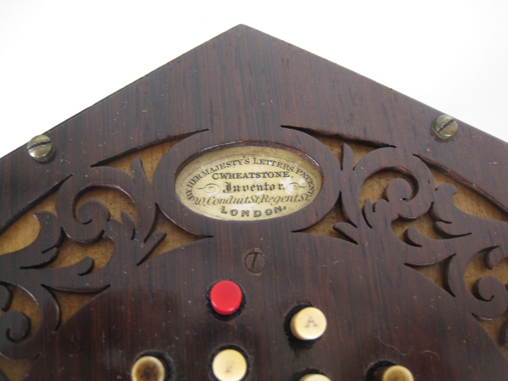 A 19th Century rosewood cased hexagonal Concertina, labelled C Wheatstone, Inventor, 20 Conduit - Image 9 of 10