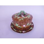 A George Jones majolica Cheese Dish and Cover of coopered circular form, rose design, base 10in