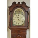 An early 19th Century Longcase Clock with painted arched dial having rolling arch, subsidiary