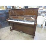 A Welmar, London, Upright Piano in mahogany case, overstrung, No 84335 for 1984 with three pedals,