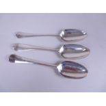 Three George II silver Table Spoons, hanovarian pattern, one with crest, one initials M.H., London