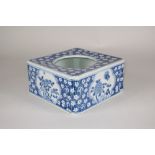 A Japanese blue and white porcelain Brushwasher, 19th Century, of square form with circular