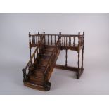 A mid 20th Century mahogany apprentice model of a Staircase, with rectangular landing and central