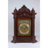 A 19th Century Bracket Clock having three train fusee striking and chiming movement, engraved