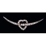 A Victorian Diamond Crescent and Heart Brooch pavé-set throughout old-cut stones in silver backed