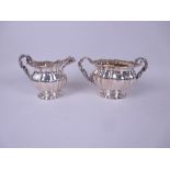 A George IV silver two-handled Sugar Bowl and Milk Jug with gilt interiors, finely decorated fruit