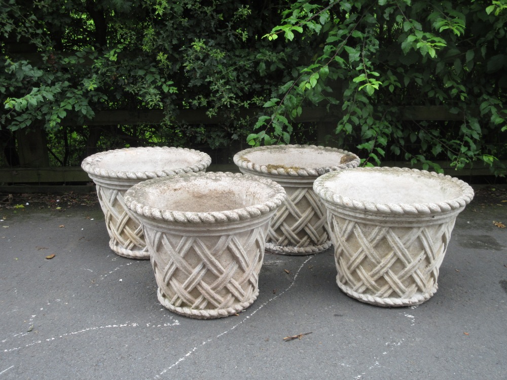 A set of four composition Garden Planters with lattice designs, 1ft 9in diam x 15in H