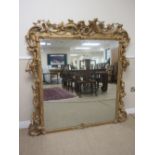 A George III style gilt framed Overmantel Mirror with leafage and scroll decoration A/F, 5ft 2in H x