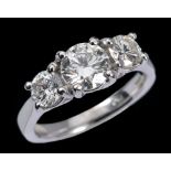 A Diamond three stone Ring claw-set graduated brilliant-cut stones, total diamond weight 1.52cts, in