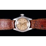 A 1940's lady's Rolex Oyster Perpetual Wristwatch, the cream dial with gilt hourly batons