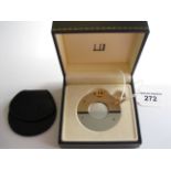 A Dunhill bi-metal circular Cigar Cutter with black leather pouch, in original box