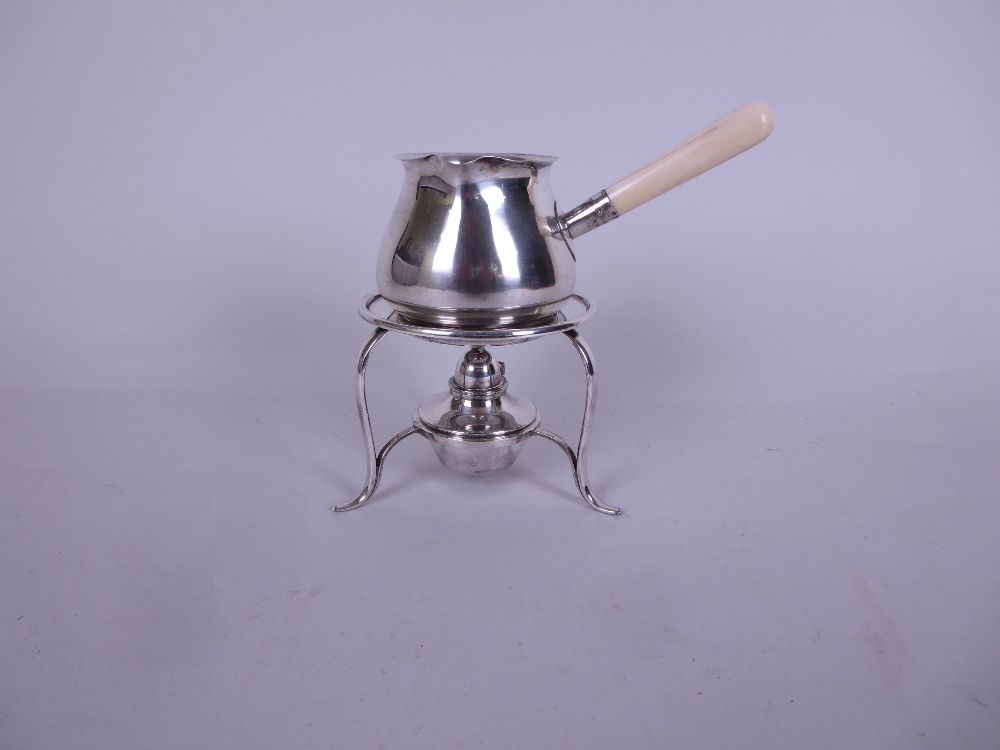 An Edward VII silver Brandy Saucepan with turned ivory handle, Sheffield 1907, on plated Stand - Image 2 of 3