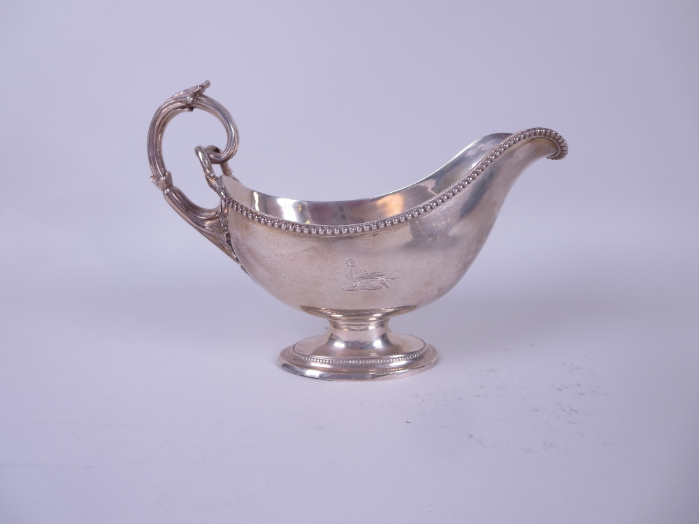 A Victorian silver large Sauce Boat engraved bird crest and monogram, beaded rim, leafage scroll - Image 2 of 3