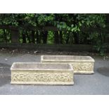 A pair of rectangular Garden Planters with frieze of putti, 2ft 2in L