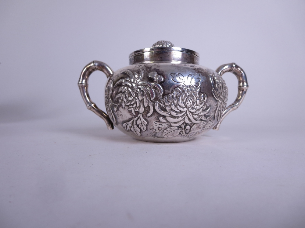 A Chinese silver three piece Tea Service decorated insects and chrysanthemum, the teapot and sucrier - Image 7 of 10