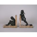 A pair of Art Deco alabaster and bronze Bookends depicting Chinese children. By Hester Mabel