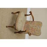 An early 18th Century style Child's Armchair, with petit point embroidered padded back and seat,