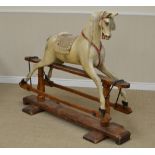An English dappled grey Rocking Horse, attributed to F. H. AYRES, with glass eyes, flared nostrils
