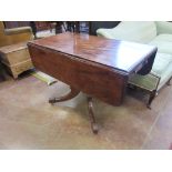 A Regency mahogany Pembroke Table fitted one end drawer on turned column and quadruple splay base,