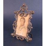 A 19th Century pencil/watercolour Portrait Miniature of a young gentleman in ornate cut steel
