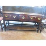 An 18th Century oak Dresser Base fitted three drawers with potboard base, 4ft 10in W