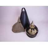 A Prussian Officer's Pickelhaube of the Landwehr Reserve complete with field cover and leather
