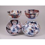 Four Japanese Imari Bowls, Meiji Period, variously decorated to the inside and out with flowers,