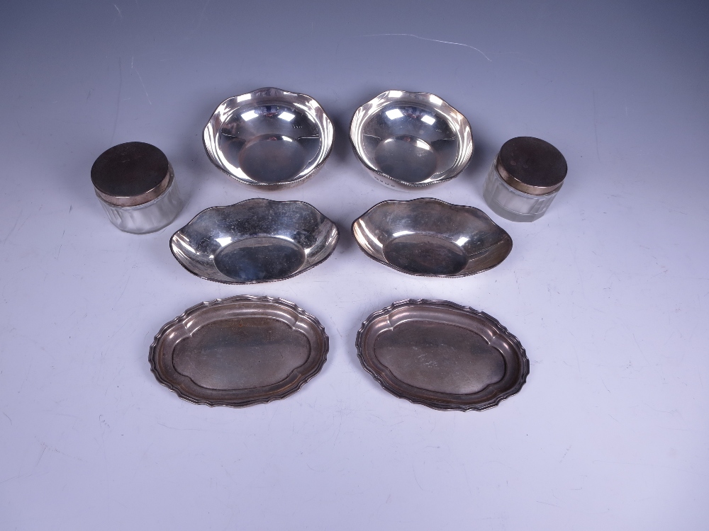 A pair of George V silver circular Bowls with beaded rims, Sheffield 1925, pair of matching oval