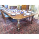 A 19th Century mahogany Dining Table, the moulded rectangular top with four leaves above a drop