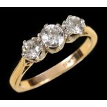 A Diamond three stone Ring claw-set graduated old-cut stones, stamped PLAT 18ct, ring size M 1/2