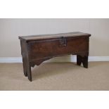 A 17th Century oak Plank Coffer with moulded detail and shaped spandrels, 3ft 11in W