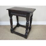 A 17th Century oak Joint Stool with moulded rectangular top above scratch carved frieze on turned