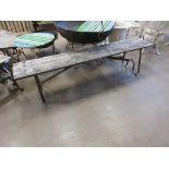 *A hardwood Chai Bench on wrought iron base, 6ft 3in L (Sold plus VAT)
