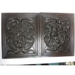 A fine pair of 17th Century oak Panels finely carved figures in high relief within scroll surrounds,