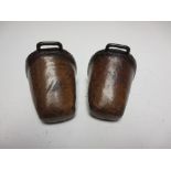 A rare pair of 18th Century child's leather Stirrups with punched design and metal buckle, 4in