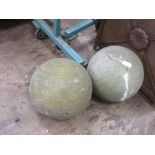 *A pair of carved sandstone Spheres, 1ft D (Sold plus VAT)