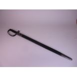 A scarce saw back Sword Bayonet for the Martini Henry Artillery Carbine, complete in original