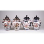 Two pairs of Japanese Imari Vases, 18th/19th Century, of shouldered oviform, painted with