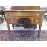 A 19th Century mahogany Writing Table with leather inset surface above one long and two short