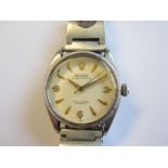 A Gentleman's Rolex Oyster Perpetual Wristwatch, the textured cream dial with arabic numerals at