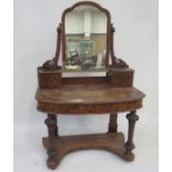 A mid Victorian burr walnut Dressing Table, with arched mirror, four small side drawers, concealed