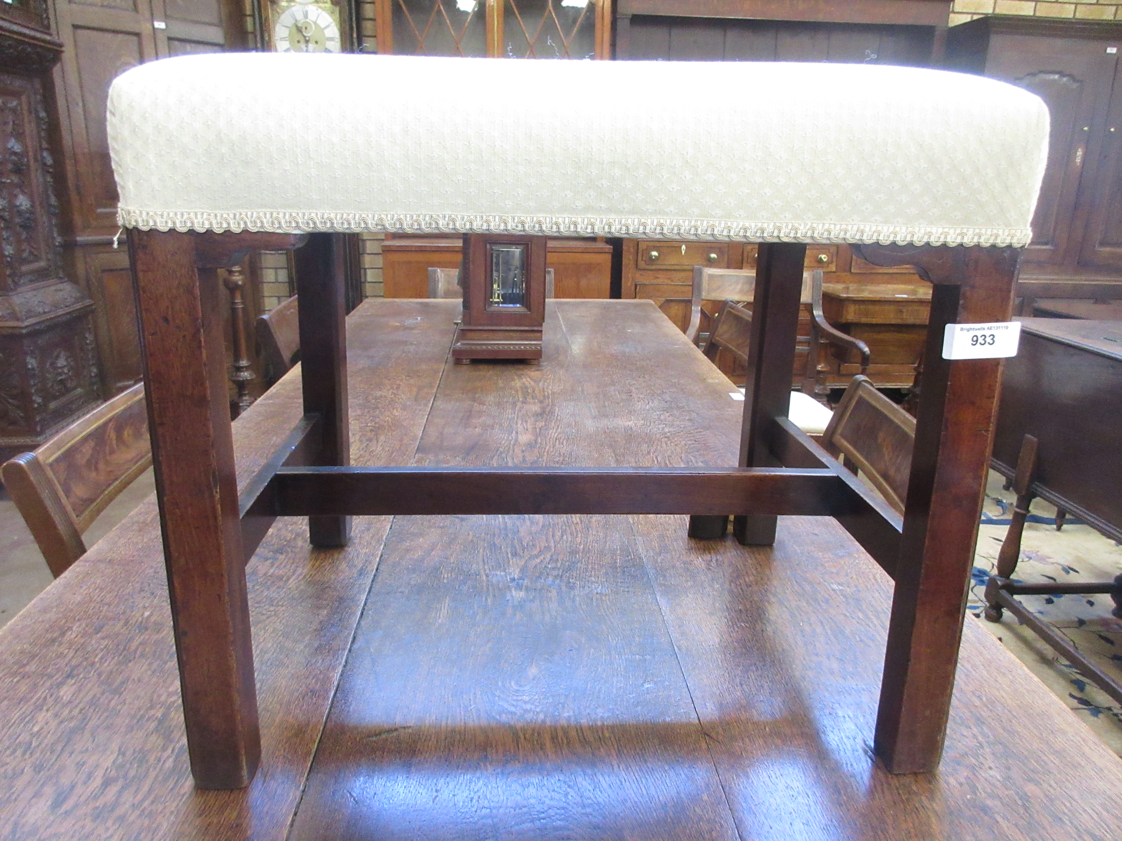 A George III mahogany framed Dessing Stool with pale stuff over seat on chamfered square legs united