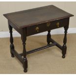 A 17th Century oak Side Table fitted frieze drawer with drop handles on baluster turned and square