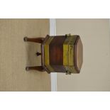 A George III mahogany and brass bound Cellarette, of hexagonal form, caddy-moulded hinged top,