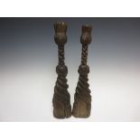 An unusual pair of early oak Scottish Finials with thistle above carved woven rope and spiral bases,