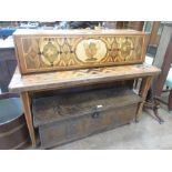 A Dutch marquetry Side Table with raised top having fall down front enclosing drawers and pigeon